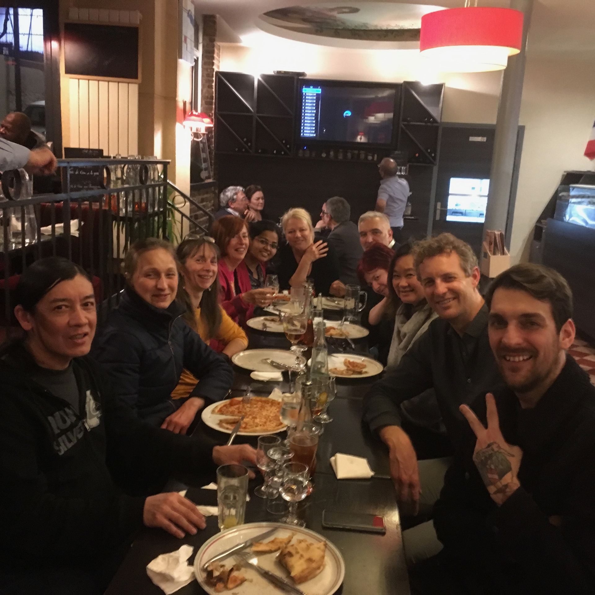 Abbi at a dinner with French colleagues in Paris